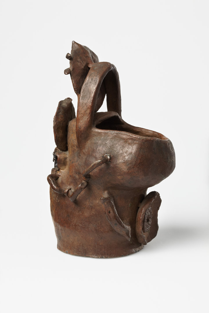 Paul Gauguin, Vase with Medallion, 1886–87, unglazed reddish stoneware, decorated with white and blue-black slip, 24.5 × 15.5 × 12.5 cm, Designmuseum Denmark, Copenhagen